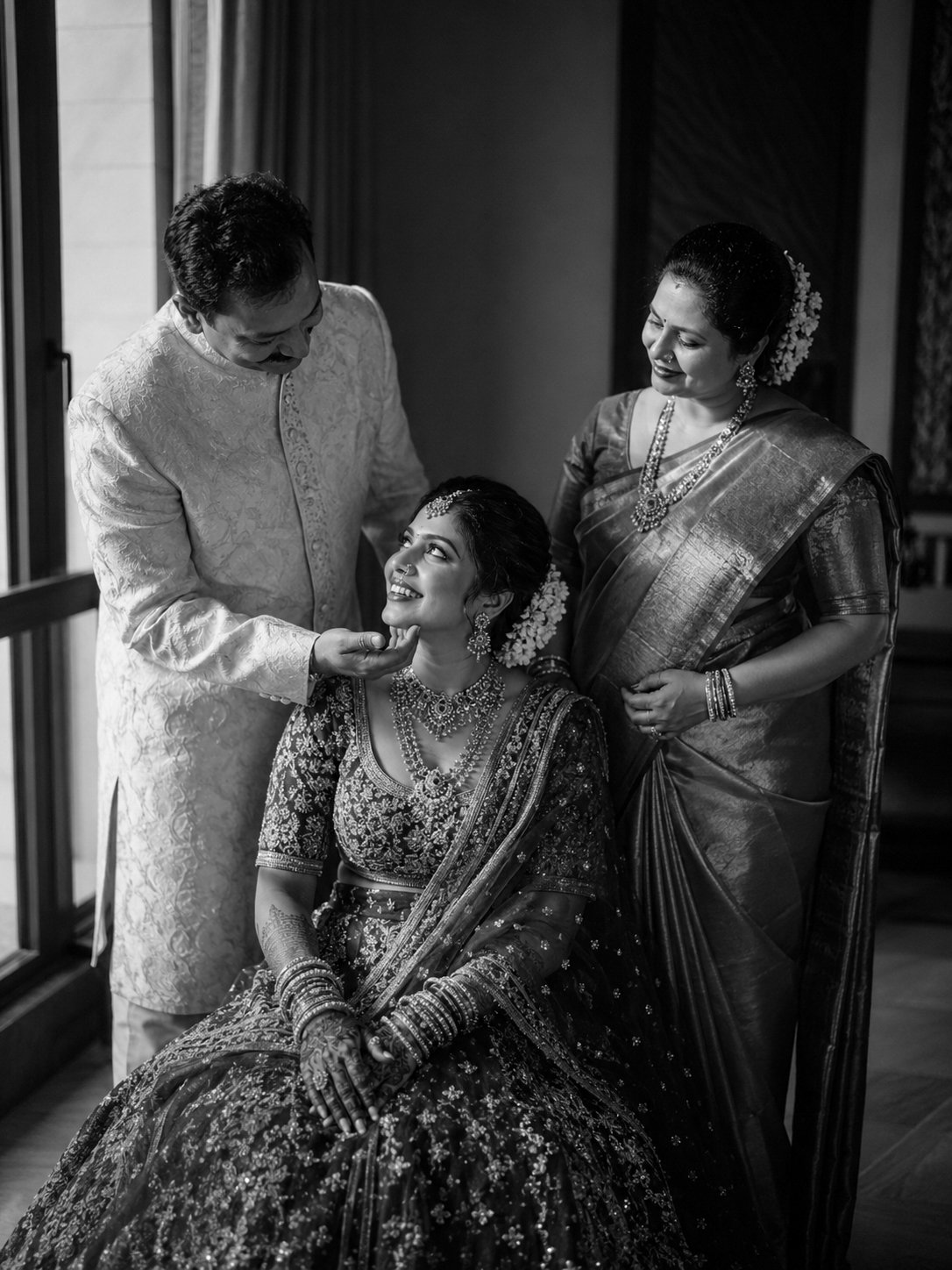 Candid family moment during a wedding photographed by Adirala Studios